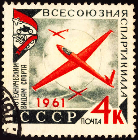 Moscow, Russia - September 17, 2020: stamp printed in USSR (Russia), shows glider plane in sky, series Spartakiada of Technical Sports, circa 1961のeditorial素材