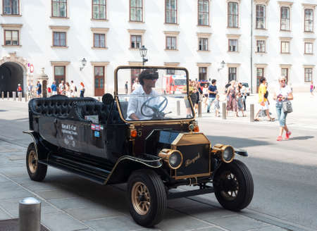 Vienna, Austria - July 31, 2019: Beautiful retro car - traditional vehicle for tourists in center of Viennaのeditorial素材
