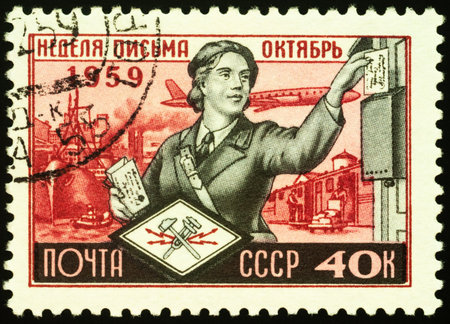 Moscow, Russia - February 05, 2021: stamp printed in USSR (Russia) shows Woman letter carrier, series International Letter Writing Week, circa 1959のeditorial素材