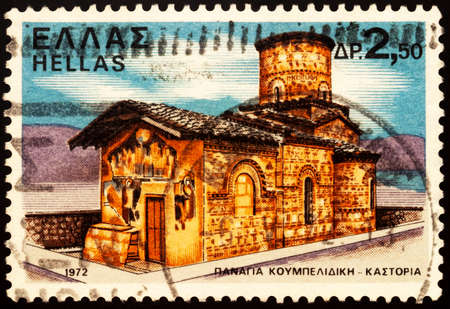 Moscow, Russia - February 26, 2021: stamp printed in Greece shows Church of Panagia Koumbelidiki, Kastoria, West Macedonia, Greece, series Monasteries and Churches, circa 1972のeditorial素材