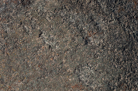 Texture of flat dark gray stone surface