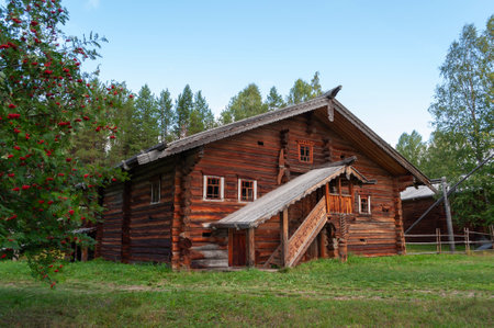 Old wooden house in northern russian village. Open air Museum of Wooden Architecture, Malye Korely, Arkhangelsk, Russia. Summer dayの写真素材
