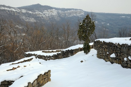 Ruins of Tsarevets fortress and mountains in the city of Veliko Tarnovo in Bulgariaの写真素材