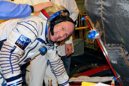 BAIKONUR, KAZAKHSTAN  DECEMBER 9: Expedition 31 ESA crewmember Andre Kuipers flashes a smile as he boards Soyuz TMA-03M spacecraft before fit check December 9, 2011 at Baikonur Cosmodrome, Kazakhstanのeditorial素材