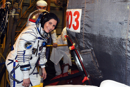BAIKONUR, KAZAKHSTAN  NOVEMBER 12, 2014: NASA Flight engineer Samantha Cristoforetti before entering Soyuz TMA-15M spacecraft hatch for a dress rehearsal fit check in the Baikonur Cosmodrome Integration Facility.のeditorial素材