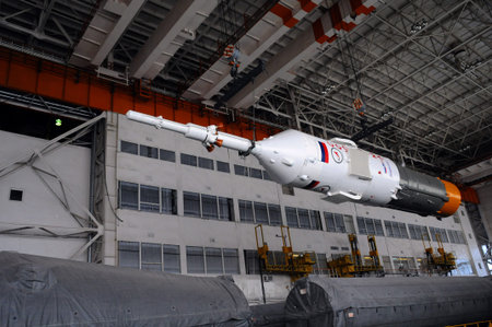 BAIKONUR, KAZAKHSTAN - DECEMBER 18, 2011: Part of Soyuz spacecraft is being relocated inside...