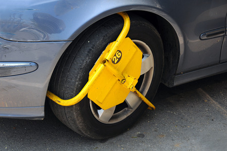 Wheel lock attached for illegal parking in Bulgariaの写真素材