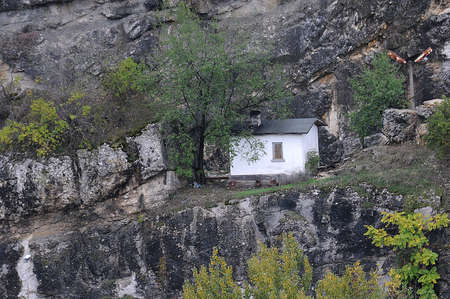 White house near the mountain railroad track in Bulgariaの写真素材