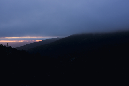 Stunning sunset between mountainsの写真素材