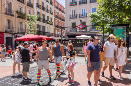 Popular neighborhood of Chueca, known for its numerous neighbors and LGBT environment, decorated and full of life during the day of gay prideのeditorial素材