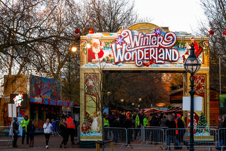 London, UK - November 25, 2016 - Crowd at the entrance of Winter Wonderland, a Christmas fair in Hyde Parkのeditorial素材
