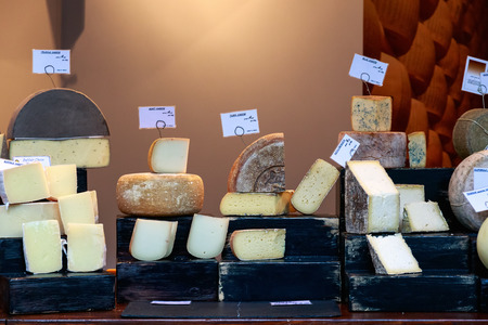 Variety of cheese on display at Borough Market in Londonのeditorial素材