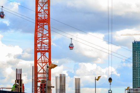 London, UK - June 25, 2017 - London cable car seen through a new development construction site in North Greenwichのeditorial素材