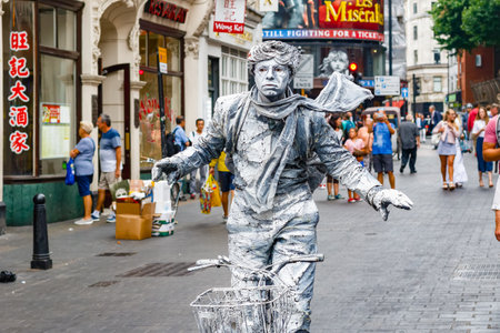 London, UK - July 22, 2019 - Street artist performing living statue in London Chinatownのeditorial素材