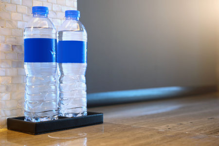 two bottles of water on the tableの写真素材