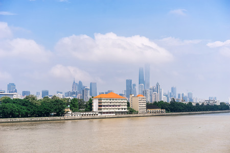 GUANGZHOU, CHINA - Oct.7: Day view of buildings by the Pearl River. The modern buildings on both sides of the Pearl River make it a beautiful landscape of the city.のeditorial素材