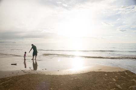 people playing on the beachの写真素材