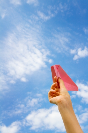 hand with a paper airplane.の写真素材