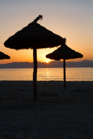 Sunset over the beach の写真素材