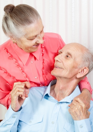 Closeup portrait of a smiling elderly coupleの写真素材