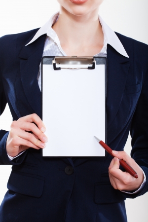 beautiful  business woman showing tabletの写真素材