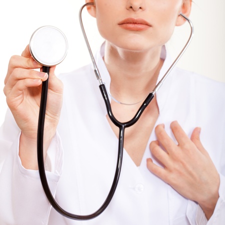 Portrait of a beautiful woman doctor with a stethoscope の写真素材