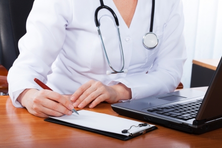 Doctor working in hospitalの写真素材