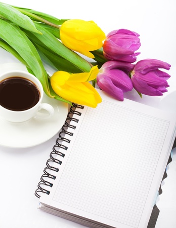 Flowers, coffee and notebook の写真素材