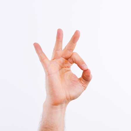 Man s hand shows sign okay  の写真素材