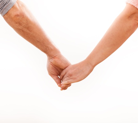 Holding hands couple on white background の写真素材