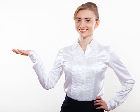 Cute business woman smiling for your advertisementの写真素材