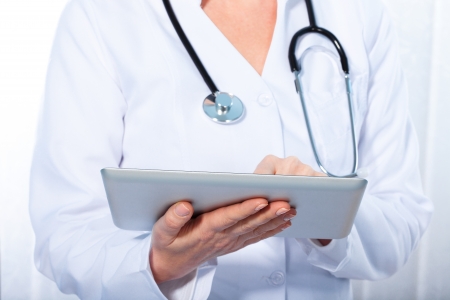 doctor working with  tablet,の写真素材