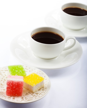 Cup of coffee and sweetsの写真素材