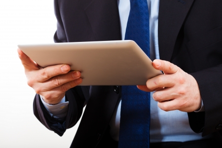 Portrait of young man holding  tabletの写真素材
