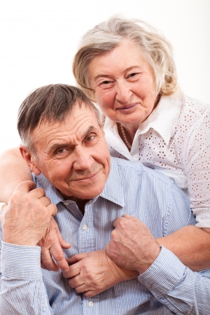 Closeup portrait of smiling elderly coupleの写真素材