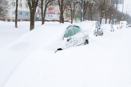 Car covered with fresh snow  Kiev, Ukraine 23 03 2013のeditorial素材