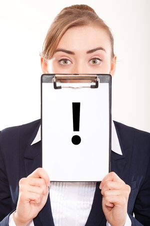 Business woman shows signs on  white billboardの写真素材