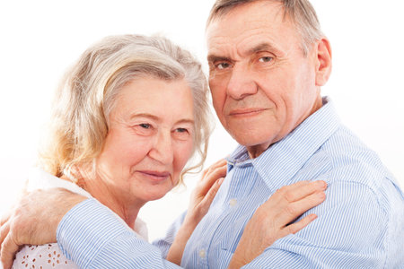 portrait of smiling elderly couple
