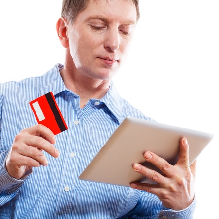 Portrait of young man holding  tabletの写真素材