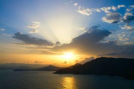 Summer view of the sea and mountain rangeの写真素材