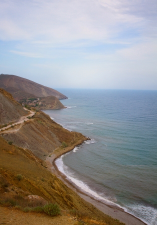 Summer view of the sea and mountain rangeの写真素材