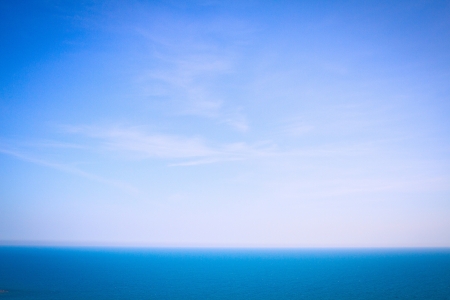 Summer view of the sea and mountain rangeの写真素材