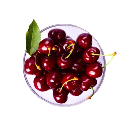 perfect sweet cherries with  leaf isolated on white background の写真素材