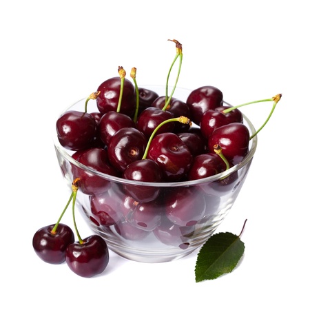 perfect sweet cherries with  leaf isolated on white background の写真素材