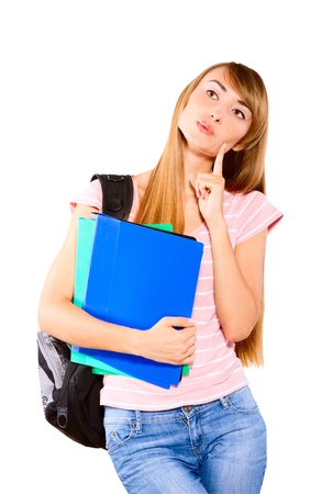 Beautiful female student holding notebook and smiling, isolated   Concept of successの写真素材