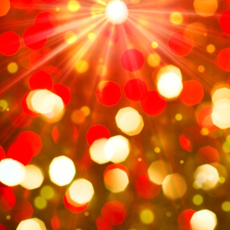 Red golden glowing background  Christmas card  Abstract background with bokeh defocused lights and starsの写真素材