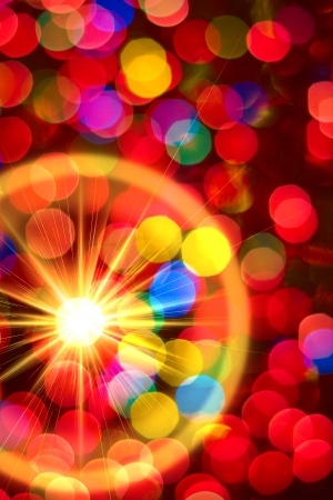 Multi-colored glowing background  Christmas card  Abstract background with bokeh defocused lights and starsの写真素材