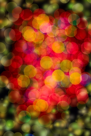 Multi-colored glowing background  Christmas card  Abstract background with bokeh defocused lights and starsの写真素材