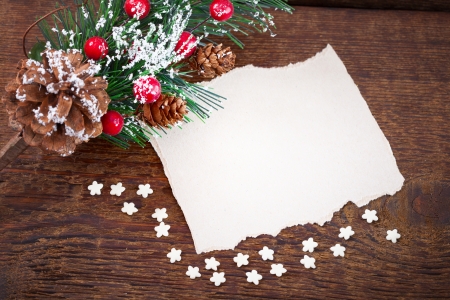 Gingerbread cookies hanging over wooden . Christmas cardの写真素材