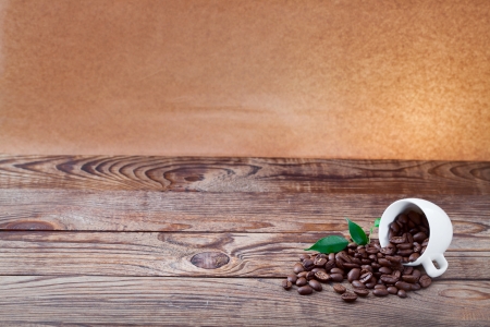 Coffee cup and saucer on  wooden table. の写真素材
